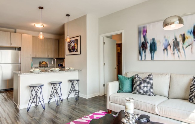 Living Room With Kitchen View at Spoke Apartments, Atlanta, Georgia
