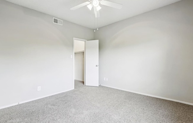 A2 floor plan bedroom with ceiling fan at Jefferson Creek Apartments in Irving, TX.