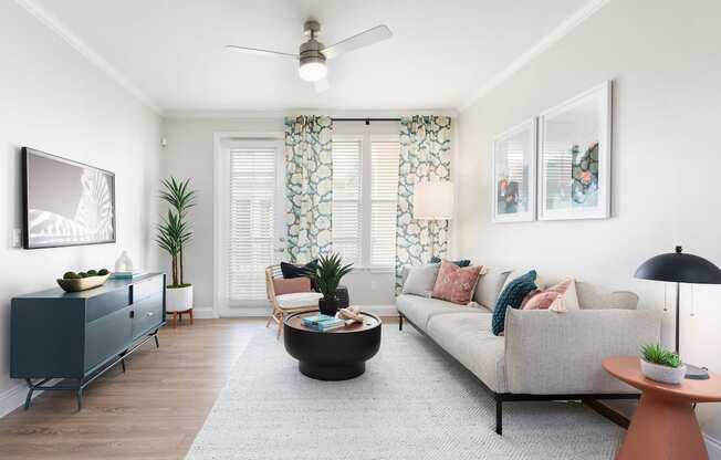 a living room with a couch and a tv