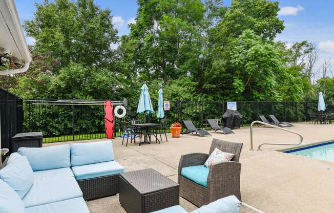 Grilling and lounge area by the poolside at Heritage Hill Estates Apartments, Cincinnati, Ohio 45227