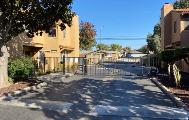Two bedroom condo in Gated Community with 2 car garage!