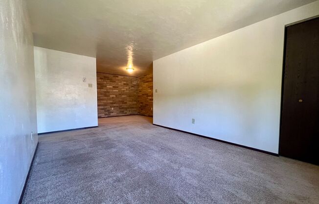 Amazing One Bedroom on the Second Floor! Built in A/C, Exposed Brick & More! Call Today!