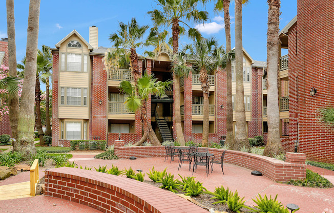 our apartments offer a courtyard with tables and chairs