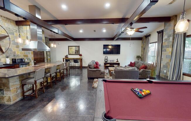Community Game room with lounge and pool table at The Canyons Apartments, Fort Worth, TX, 76116