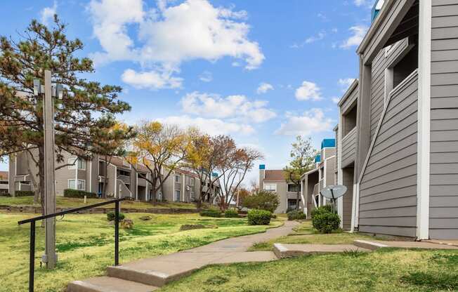 the preserve at ballantyne commons exterior view of apartments with stairs and grass