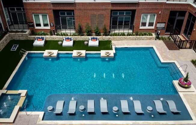 Swimming Pool With Relaxing Sundecks at Berkshire Pullman, Frisco, Texas