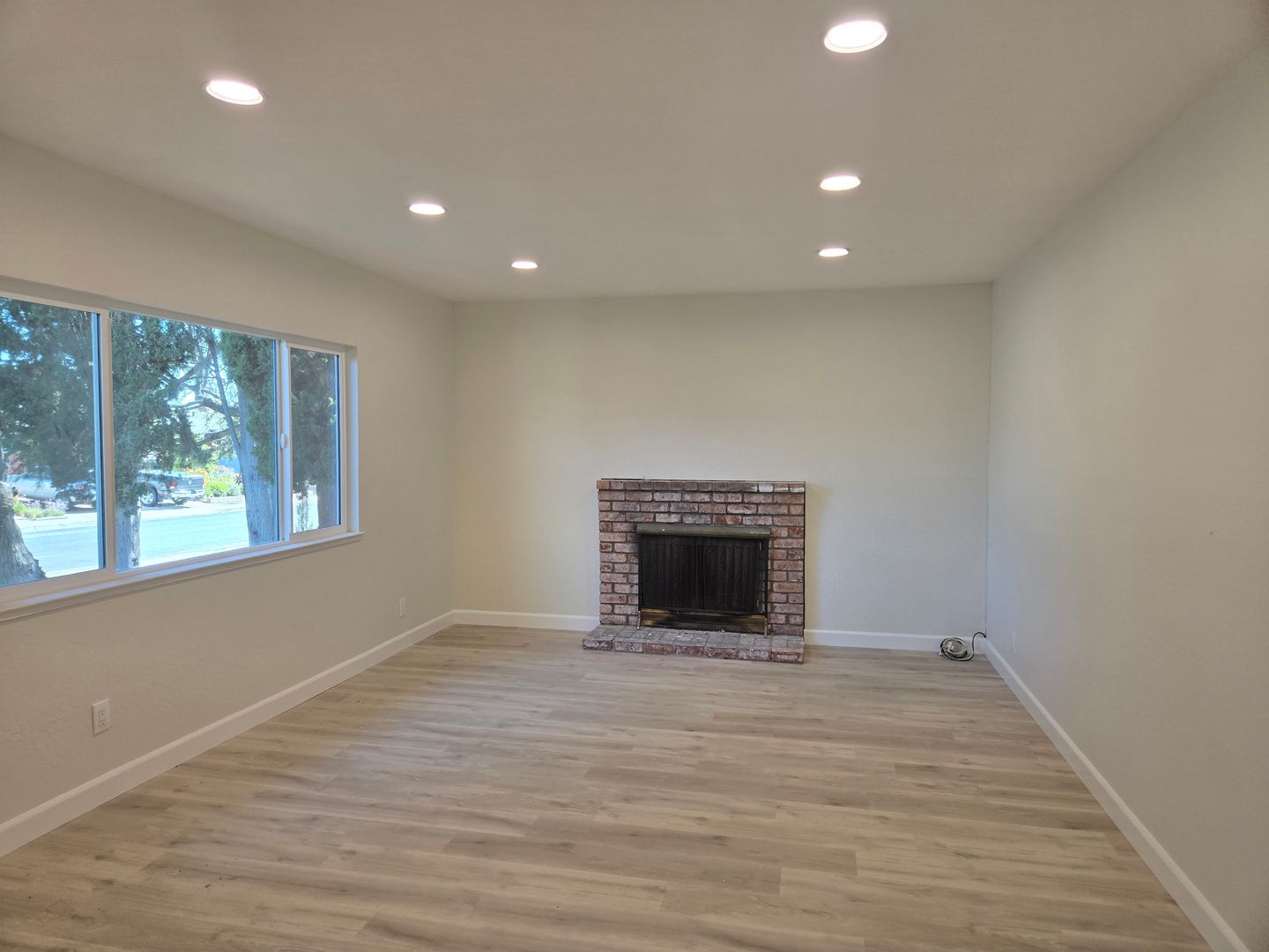 Renovated and Remodeled, New Driveway, New Yard, Kitchen and Bathrooms, Fresh Paint, Wood Floors!