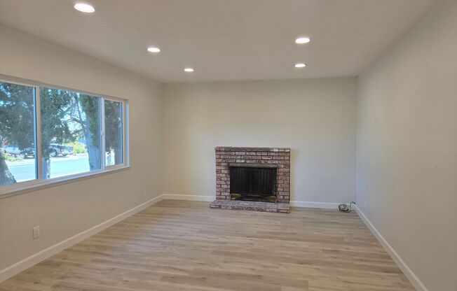 Renovated and Remodeled, New Driveway, New Yard, Kitchen and Bathrooms, Fresh Paint, Wood Floors!