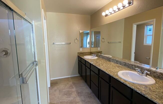 Spacious Townhouse with Loft & Rare 3-Car Garage!