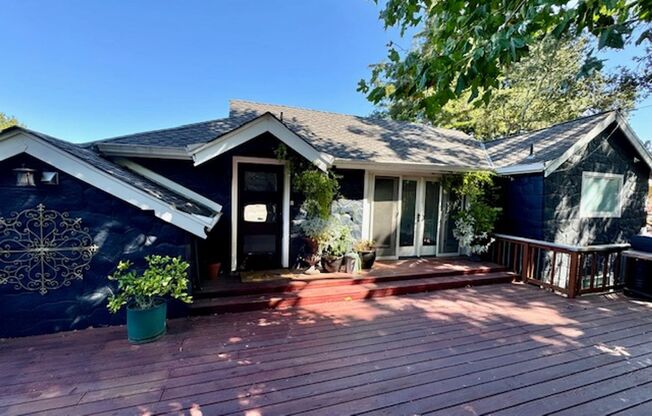 Spacious 2 story updated Orinda home with large bonus room and views!