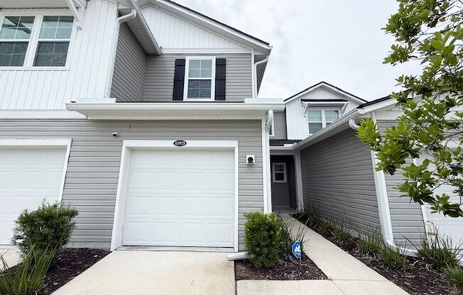 Welcome to this beautiful townhome for rent in the highly desirable Wells Creek community!