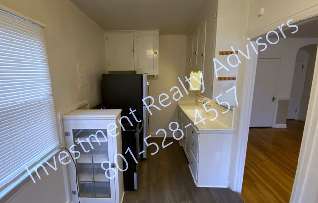 141 E 1 AVE