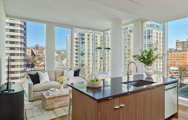 A modern kitchen with a view of the city.