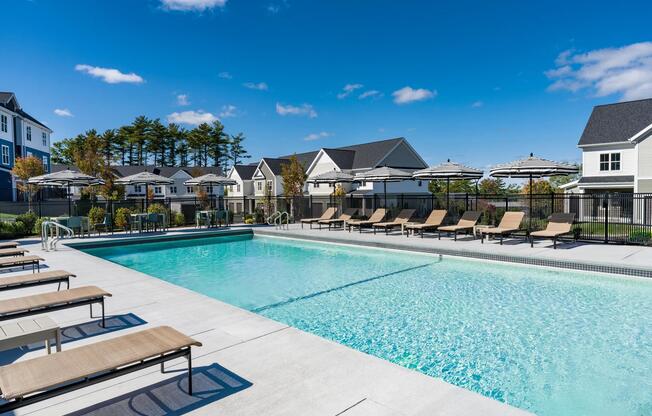 Take a dip or lounge poolside—this expansive outdoor pool offers plenty of space to unwind under the sun.