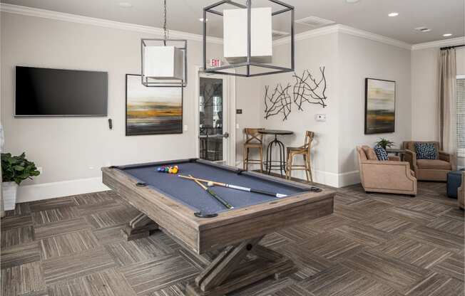 Billiards in clubhouse at Abberly Market Point Apartment Homes, Greenville, SC