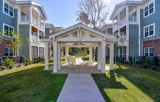 the preserve at ballantyne commons apartments courtyard with patio and chairs