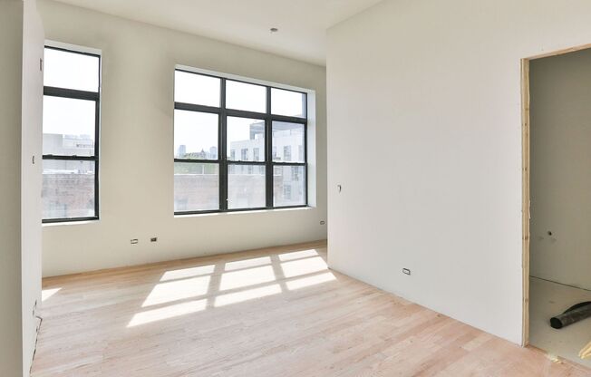 ARO- Affordable 1 Bedroom Apartment Brand New 1 Bed in Wicker Park. 12' Ceilings. Huge Windows, Elevator Building. Roof Deck. Free Internet.