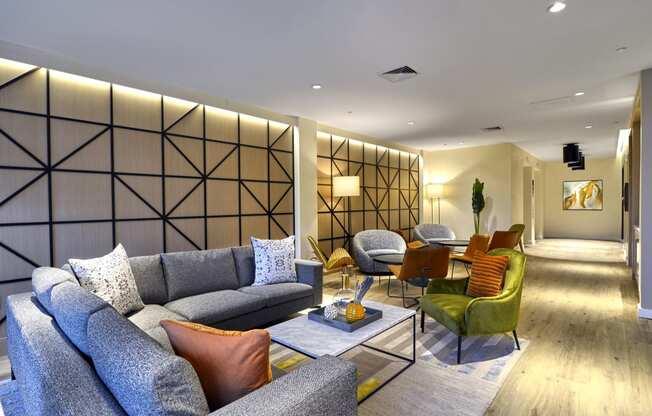 Elegant lounge area at The Mint Rahway featuring stylish seating and decor, conveniently located near Merck Pharmaceutical and Rahway Train Station.