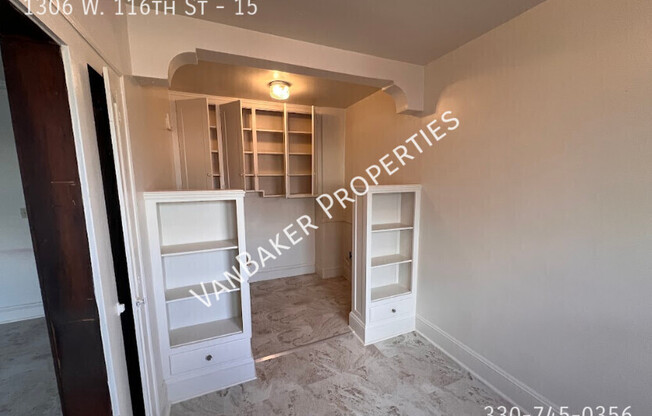 1306 W 116 ST