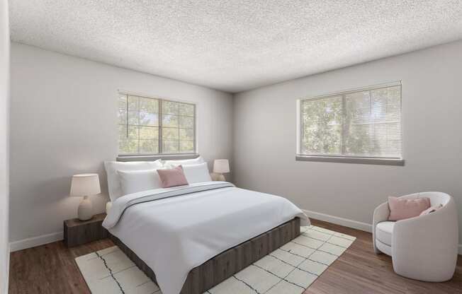 a white bedroom with a large bed and two windows at Verona, Littleton, CO