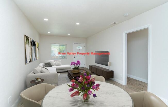 Available Now! Adorable remodeled Cottage, 3+2, CHA, Garage, fenced yard, close to Christian Brothers High School