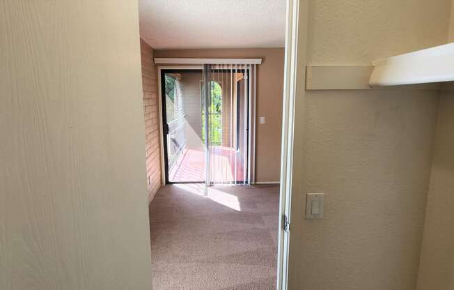 2x2 Upstairs Brown Upgrade Main Closet at Mission Palms Apartment Homes in Tucson AZ