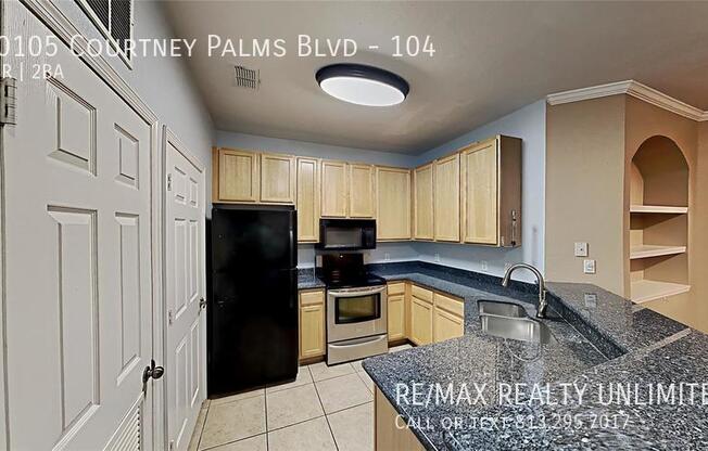 10105 COURTNEY PALMS BLVD