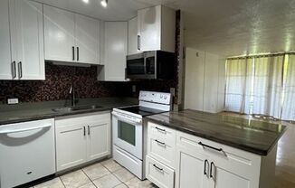 2 bedroom/1 bath Ground-level unit nestled in the serene community of Mililani.