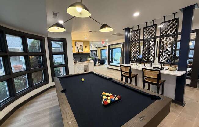 Billiards table in community clubhouse at Remington Place Apartments in Raleigh, NC