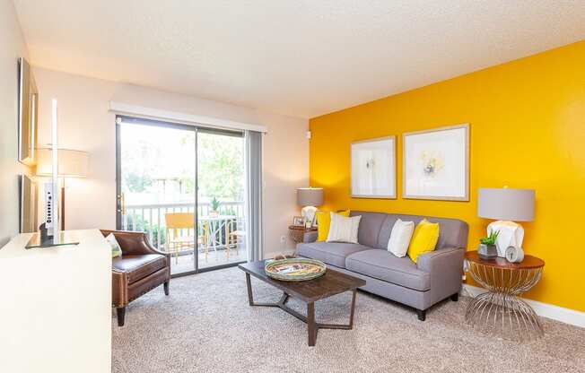 Spacious Living Room With Private Balcony at The Reserve At Barry Apartments, Kansas City, 64154
