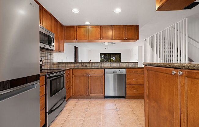Rarely available Clairemont 3-story end unit townhome.