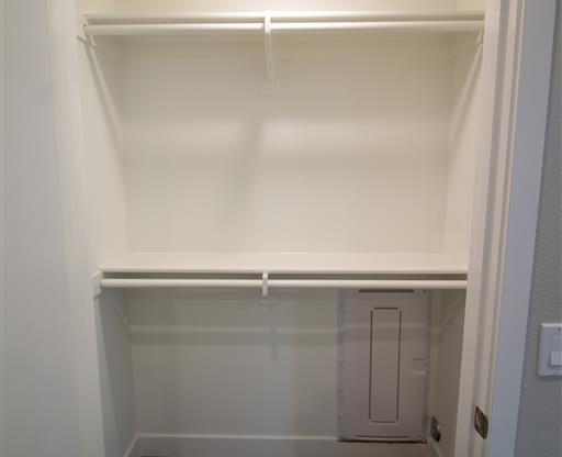 a white walk in closet with a wooden floor at Loma Villas Apartments, San Bernardino, 92408