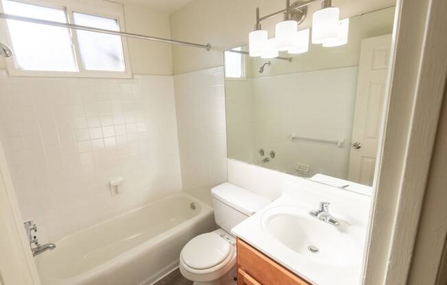 This is a photo of the bathroom in the 550 square foot 1 bedroom, 1 bath patio apartment at College Woods Apartments in the North College Hill neighborhood of Cincinnati, OH.