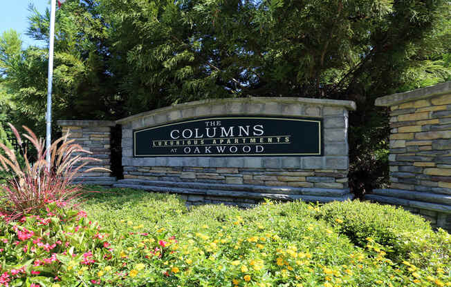 Community entrance signage at The Columns at Oakwood, 2102 Education Way, Oakwood, Georgia 30566