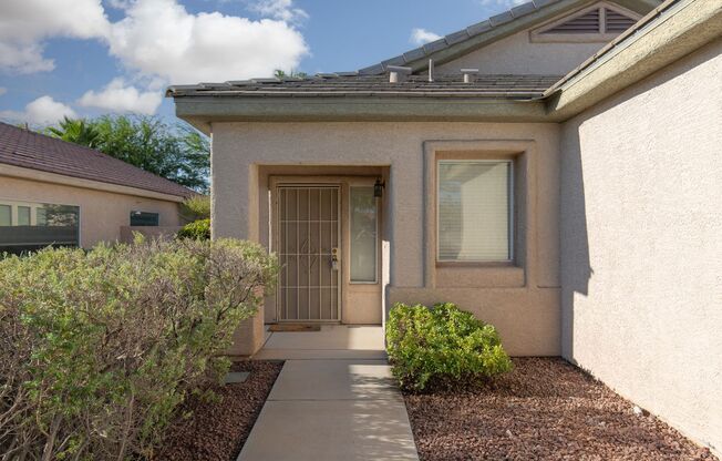 Wonderful Summerlin single story with grass backyard and island kitchen.