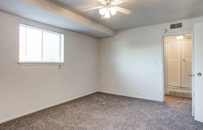 Interior view of bedroom with large window