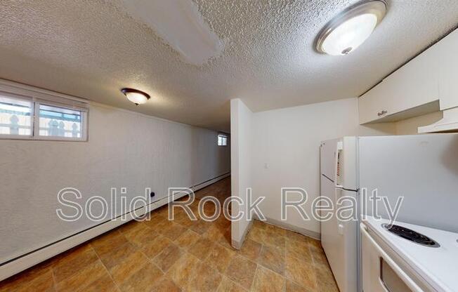 1411 S CORONA AVE
