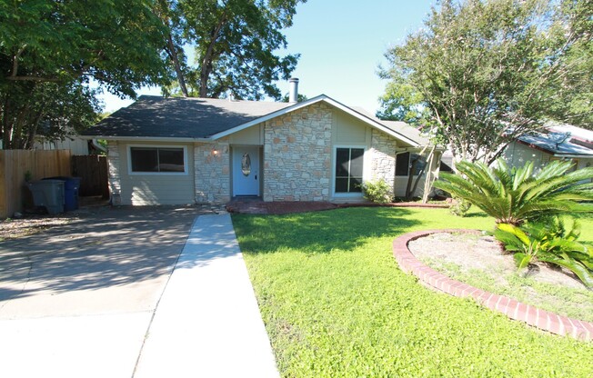 Southeast Austin Home with Vaulted Ceilings, Bonus Room & Private Backyard