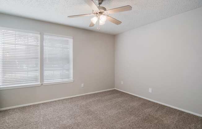 Bedroom with Ceiling Fan at Preston Villas Apartment Homes, Dallas, Texas, TX
