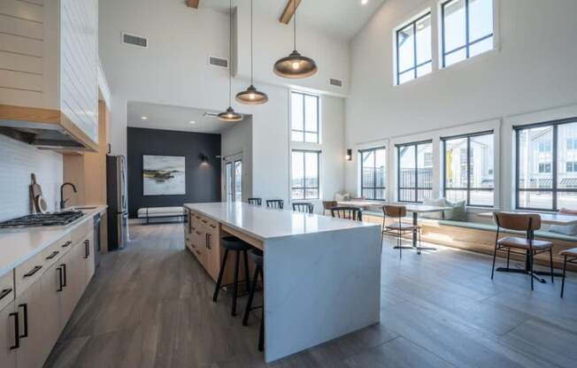 a large kitchen with a large island in the center of it at Sonder Fields in Happy Valley, OR