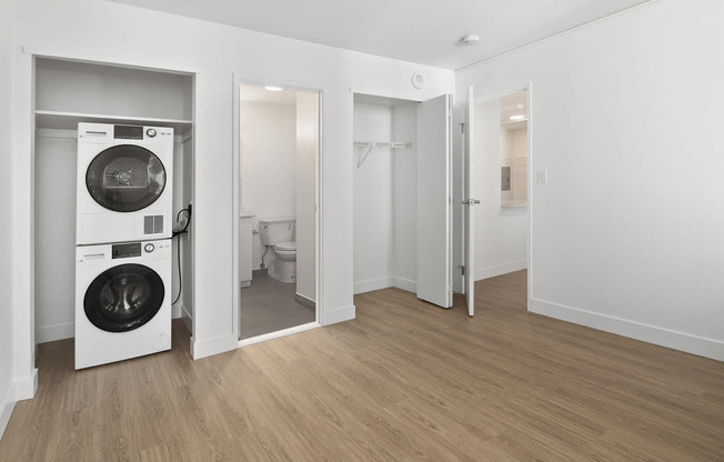 Bedroom with In-home Washer and Dryer