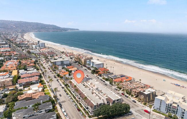 Updated, Bright & Airy Loft-Style Penthouse Condo w/ Ocean Views, Large Rooftop Deck & Balcony & Gated 2-Car Parking in the Exclusive Bay Point Community Just 50 Ft to Beach & Blocks to Hollywood Riviera!
