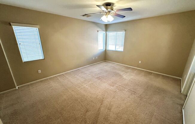 Charming 3 bed/2 bath single-family home in the heart of Blue Diamond! Tiled, downstairs entryway leads to combined kitchen and living room. Upstairs is bathed in natural sunlight, lots of accent windows and wood-rail staircase. Cozy backyard with pavers