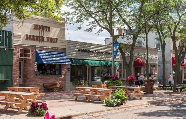 A barbeque restaurant named Henry's Barbeque Shop is located in a shopping plaza.