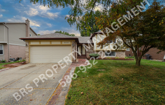 Troy 4 bedroom home with basement and attached garage