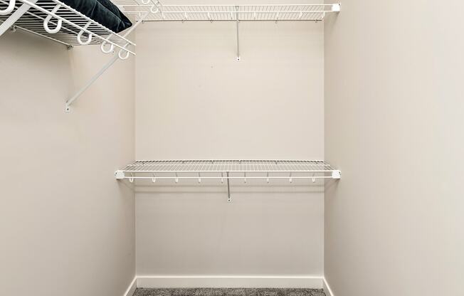 Studio, one and two bedroom apartment homes featuring stainless steel appliances, luxury vinyl floor, granite countertops, large closets and full-size washer and dryer at The Parker in Papillion, NE