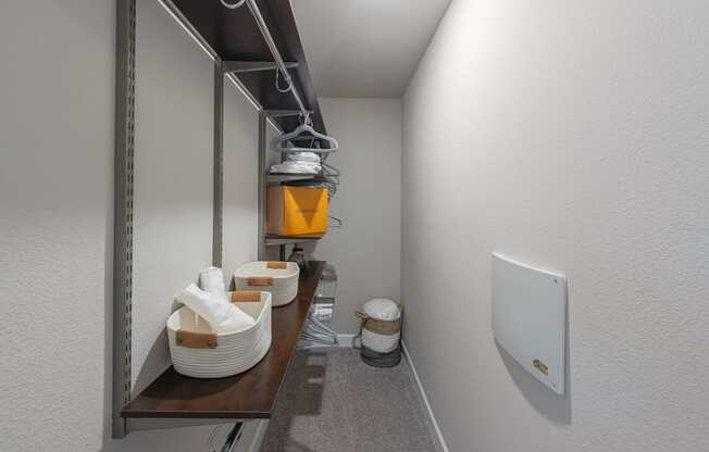 a small bathroom with a sink and a toilet in a closet