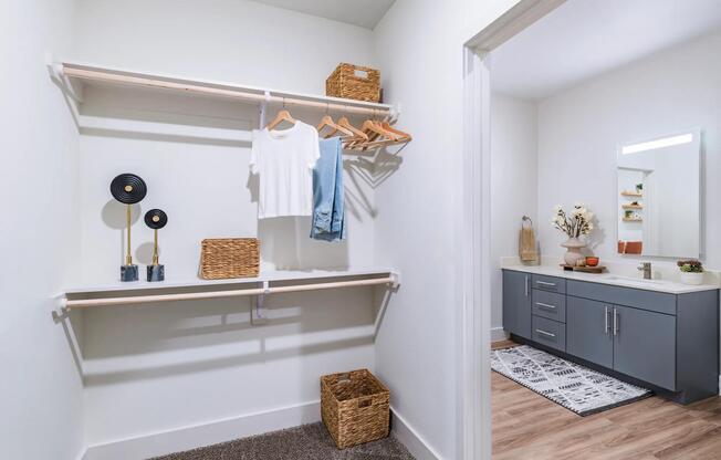 Step into style at Modera Garden Oaks with spacious custom closets, offering the perfect blend of luxury and organization for your wardrobe.