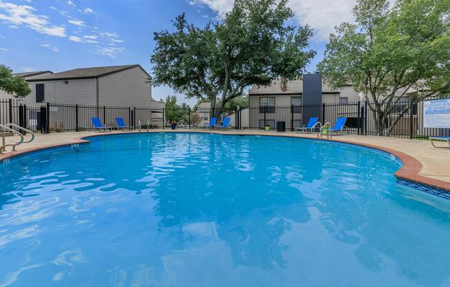 a pool next to a body of water