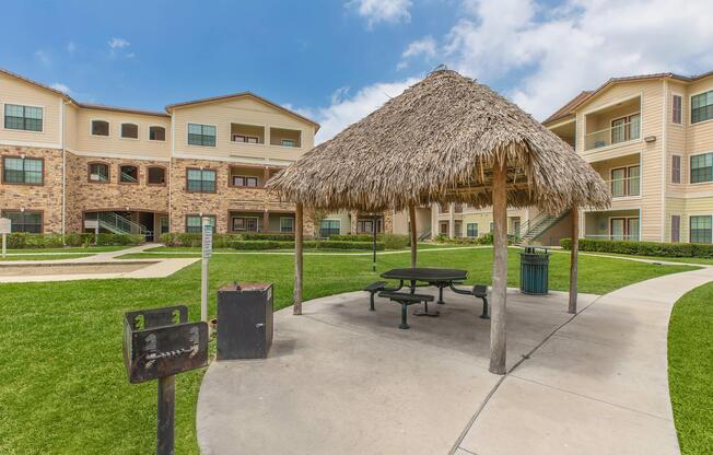 a couple of lawn chairs sitting on top of a building